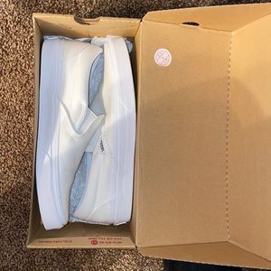 White slip on vans